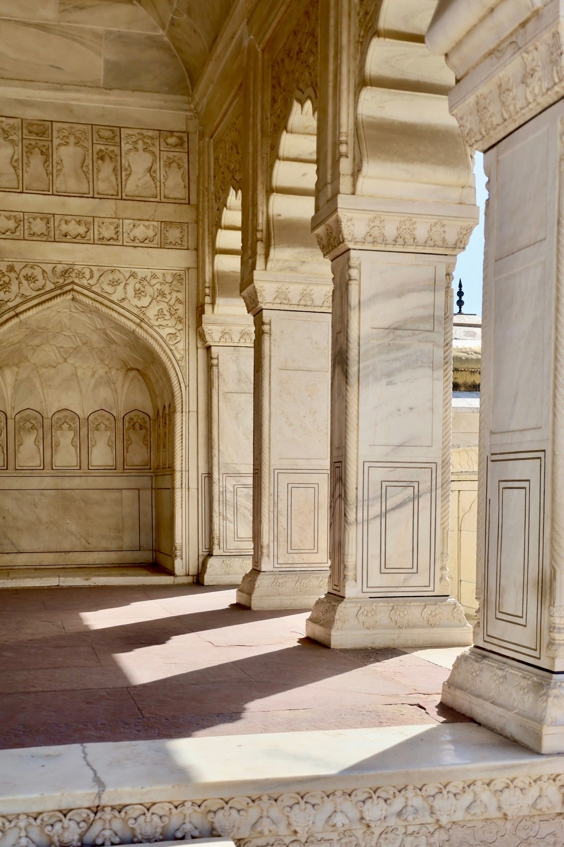 Marble columns with warm sunlight